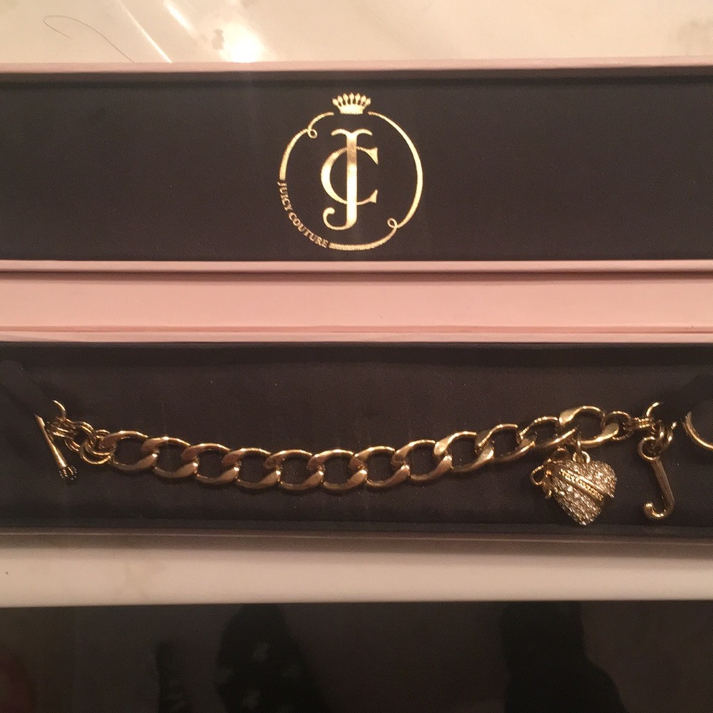 Juicy Couture gold charm bracelet w/crystal heart